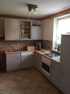 Kuchyň nebo kuchyňský kout v ubytování Ferienwohnung Morgensonne