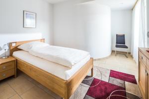 Ein Bett oder Betten in einem Zimmer der Unterkunft Schippershuus 08