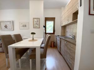 Kuchyň nebo kuchyňský kout v ubytování Welcome Apartments