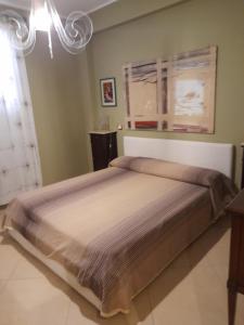 Кровать или кровати в номере Belvedere