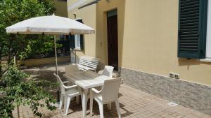 A patio or other outdoor area at Appartamento Via Bixio