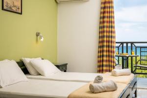 Krevet ili kreveti u jedinici u okviru objekta Sea View Hotel
