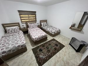 Łóżko lub łóżka w pokoju w obiekcie Z3 Hostel