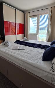 Posteľ alebo postele v izbe v ubytovaní Apartman Norma free parking
