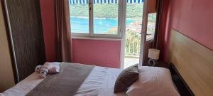 Posteľ alebo postele v izbe v ubytovaní Apartman Norma free parking