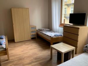 Posteľ alebo postele v izbe v ubytovaní Apartamenty pokoje "MARIA"