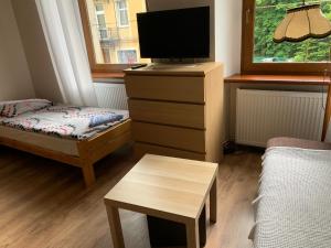 Posteľ alebo postele v izbe v ubytovaní Apartamenty pokoje "MARIA"