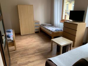 Posteľ alebo postele v izbe v ubytovaní Apartamenty pokoje "MARIA"