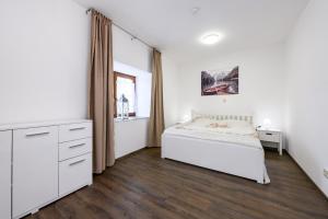 Posteľ alebo postele v izbe v ubytovaní Apartmány Závětří