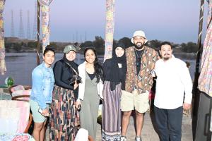 a group of people posing for a picture at Opal privat nubian hotel in Aswan
