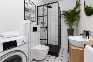 Kúpeľňa v ubytovaní Awanport Estate Gdynia by Noclegi Renters + 17 fotografií