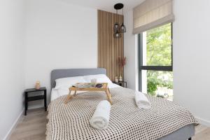 Posteľ alebo postele v izbe v ubytovaní Awanport Estate Gdynia by Noclegi Renters