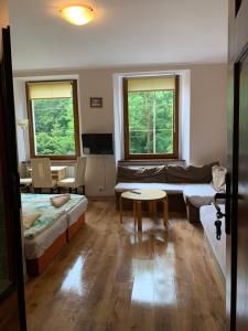 Posteľ alebo postele v izbe v ubytovaní Apartamenty pokoje "MARIA"
