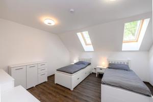 Posteľ alebo postele v izbe v ubytovaní Apartmány Závětří