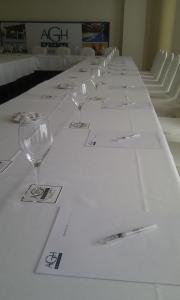 a long white table with wine glasses on it at AGH Canet in Canet de Berenguer