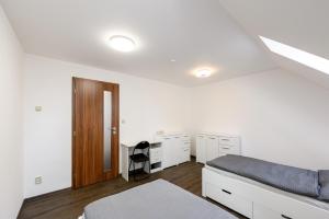 Posteľ alebo postele v izbe v ubytovaní Apartmány Závětří
