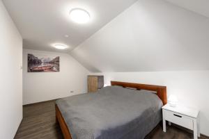 Posteľ alebo postele v izbe v ubytovaní Apartmány Závětří