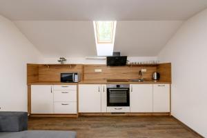 Kuchyňa alebo kuchynka v ubytovaní Apartmány Závětří