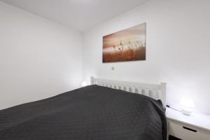 Posteľ alebo postele v izbe v ubytovaní Apartmány Závětří
