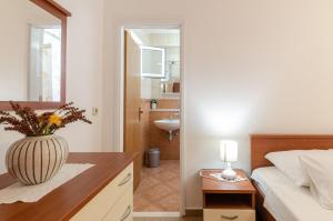 Ванная комната в Apartments Ranko +37 фотографий