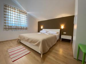 Katil atau katil-katil dalam bilik di Apartments A&A