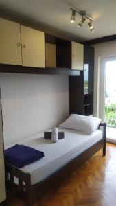 Postel nebo postele na pokoji v ubytování Vacation Home Opatija