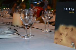 a group of wine glasses sitting on a table at AGH Canet in Canet de Berenguer