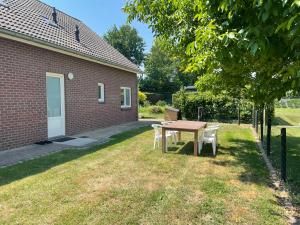 Κήπος έξω από το Vakantiewoning Op De Bos