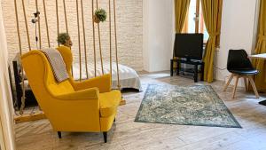 A seating area at Beautiful Place in Slovakia Bratislava Old Town Center with AC