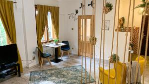 A television and/or entertainment centre at Beautiful Place in Slovakia Bratislava Old Town Center with AC