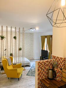 A seating area at Beautiful Place in Slovakia Bratislava Old Town Center with AC
