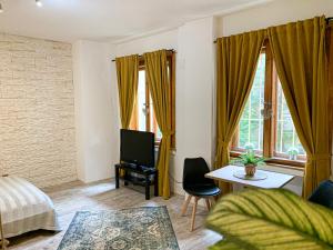 A seating area at Beautiful Place in Slovakia Bratislava Old Town Center with AC