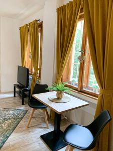 A seating area at Beautiful Place in Slovakia Bratislava Old Town Center with AC