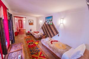 Postel nebo postele na pokoji v ubytování Riad Khabia & Spa