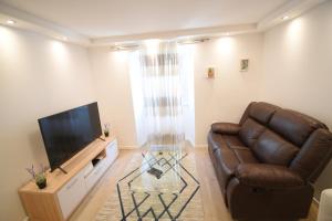 TV a/nebo společenská místnost v ubytování Apartman Veronique