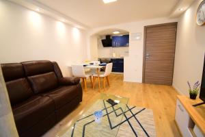 TV a/nebo společenská místnost v ubytování Apartman Veronique
