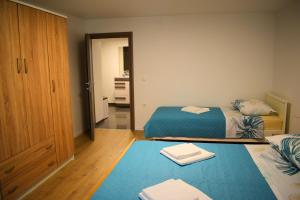 Postel nebo postele na pokoji v ubytování Apartman Veronique