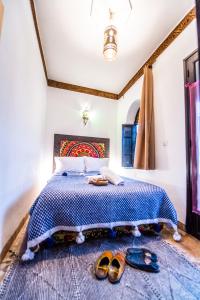 Postel nebo postele na pokoji v ubytování Riad Khabia & Spa