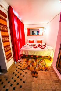 Postel nebo postele na pokoji v ubytování Riad Khabia & Spa