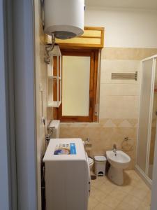 Ванная комната в Appartamento Via Pitagora