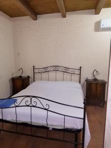 A bed or beds in a room at B&B Borgo Bellavista