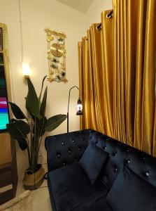TV a/nebo společenská místnost v ubytování HOMESTAY SYAABAN Kamunting Taiping Batu Kurau Ulu Sepetang