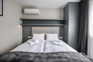Posteľ alebo postele v izbe v ubytovaní Luxury Apartment Nina with sea view