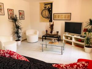 TV a/nebo společenská místnost v ubytování B&B dell'Amicizia