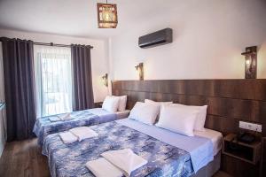 En eller flere senge i et værelse på Smyrna Hotel Dalyan + 45 billeder