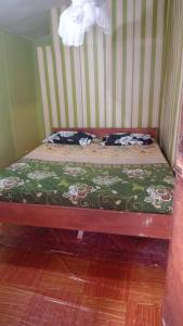 Postel nebo postele na pokoji v ubytování Fun Family Guest House n Jungle Tour