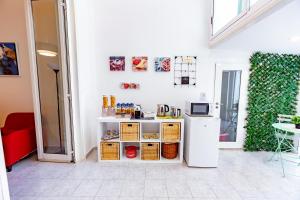A kitchen or kitchenette at Antonella home b&b