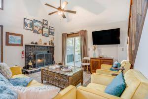 a living room with two couches and a fireplace at Elmwood Elmwood Escape A Cozy Retreat at The Hideout in Hamlin