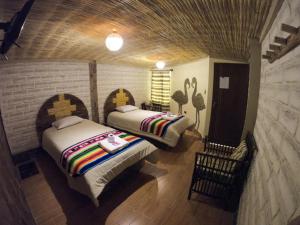HOTEL CASONA DE SAL tesisinde bir odada yatak veya yataklar