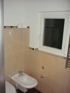Koupelna v ubytování Apartments Đerek Pisak